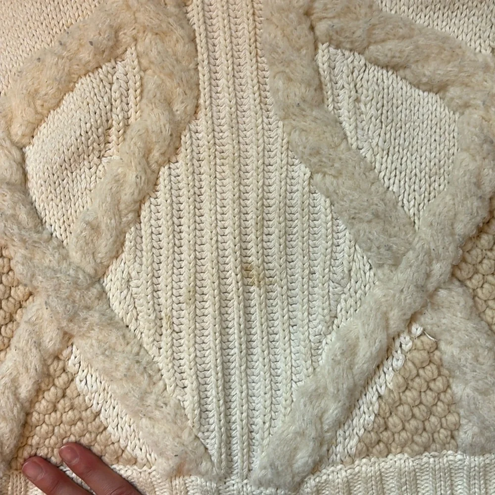 Elegant Cream Sweater with Textured Sleeves